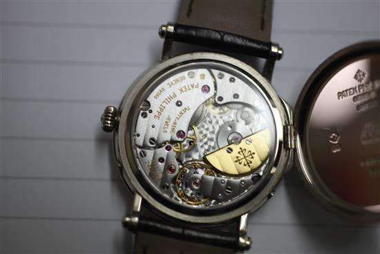 A gentlemans 18ct white gold Patek Philippe Officers wrist watch, model 5054G-001,